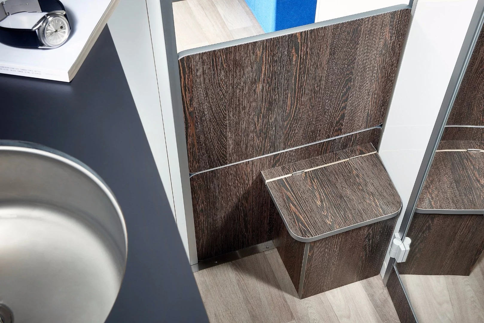 The step to the bed can also be used as storage