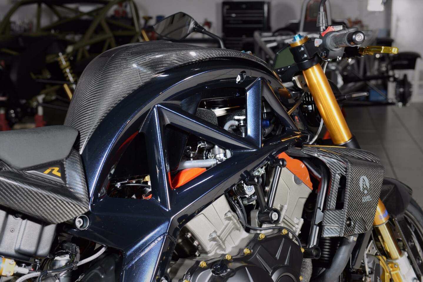 The carbon parts are also available for any other Ace version, but the black pearl-anodized frame and the red cylinder head covers suggest this is a rare 201-hp Ariel Ace R