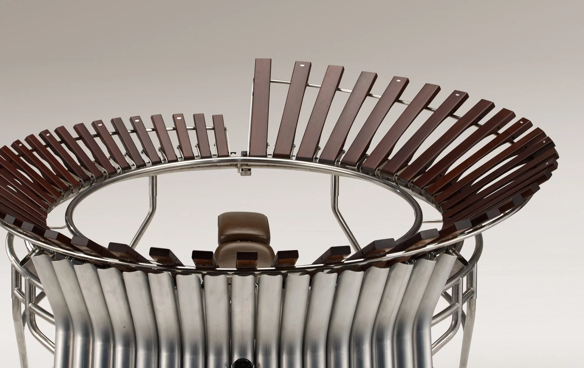 The marimba has been designed for two performers to sit inside the tubular metal frame, rather like on a motorcycle
