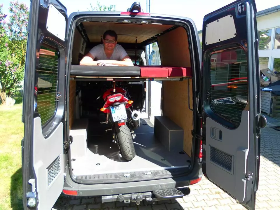 Beyond the Sprinter City and MAN Mountain 4x4 packages, Autocom offers some other a la carte equipment like this high-mount folding bed