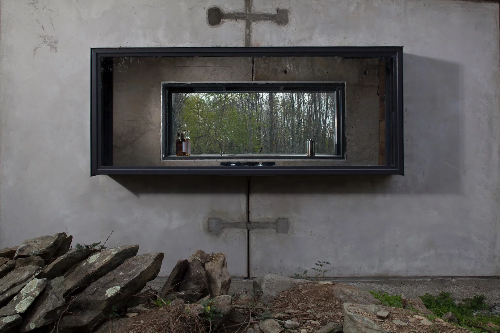 The Lost Whisky Concrete Cabin features generous glazing