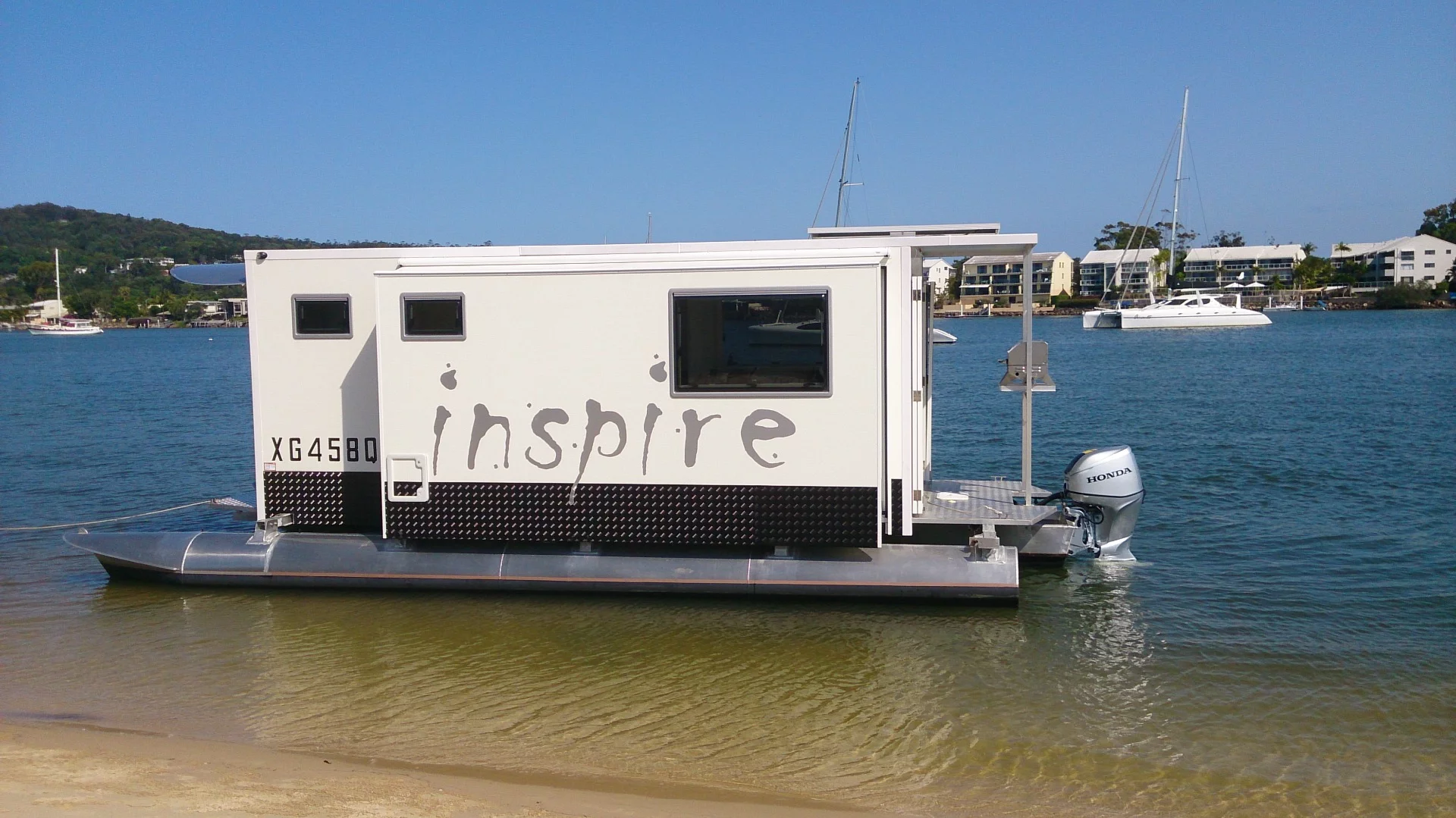 The Inspire measures about 8.4 m long when on the water (i.e. without trailer)