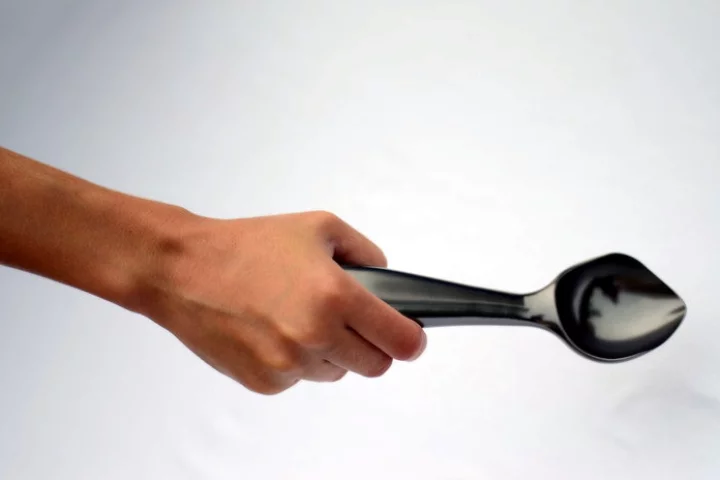 The Midnight Scoop is said to make ice cream scooping easier, and reduce strain placed on the user's wrist