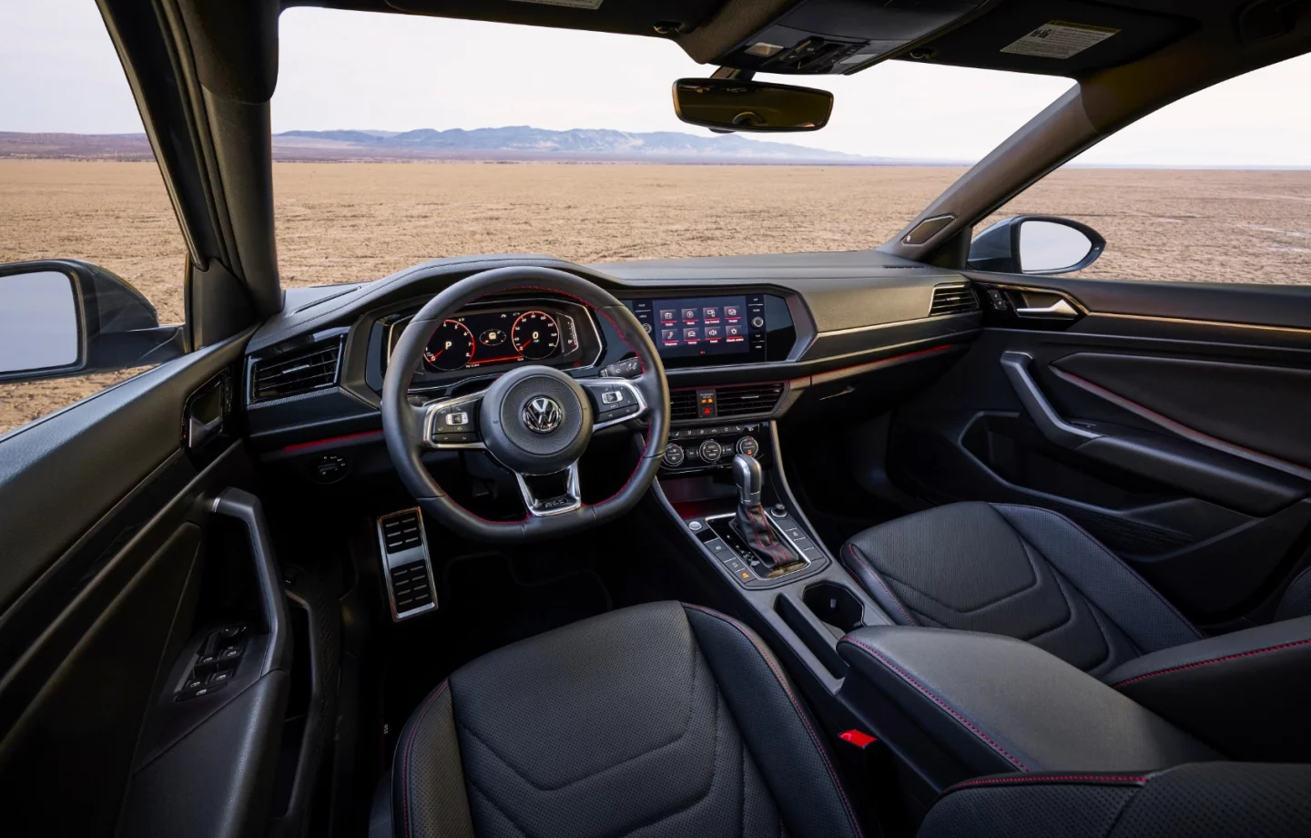 The interior of the GLI features several accents and changes to denote its sportier status, including diamond flag trim decor and a leather-wrapped steering wheel and shifter