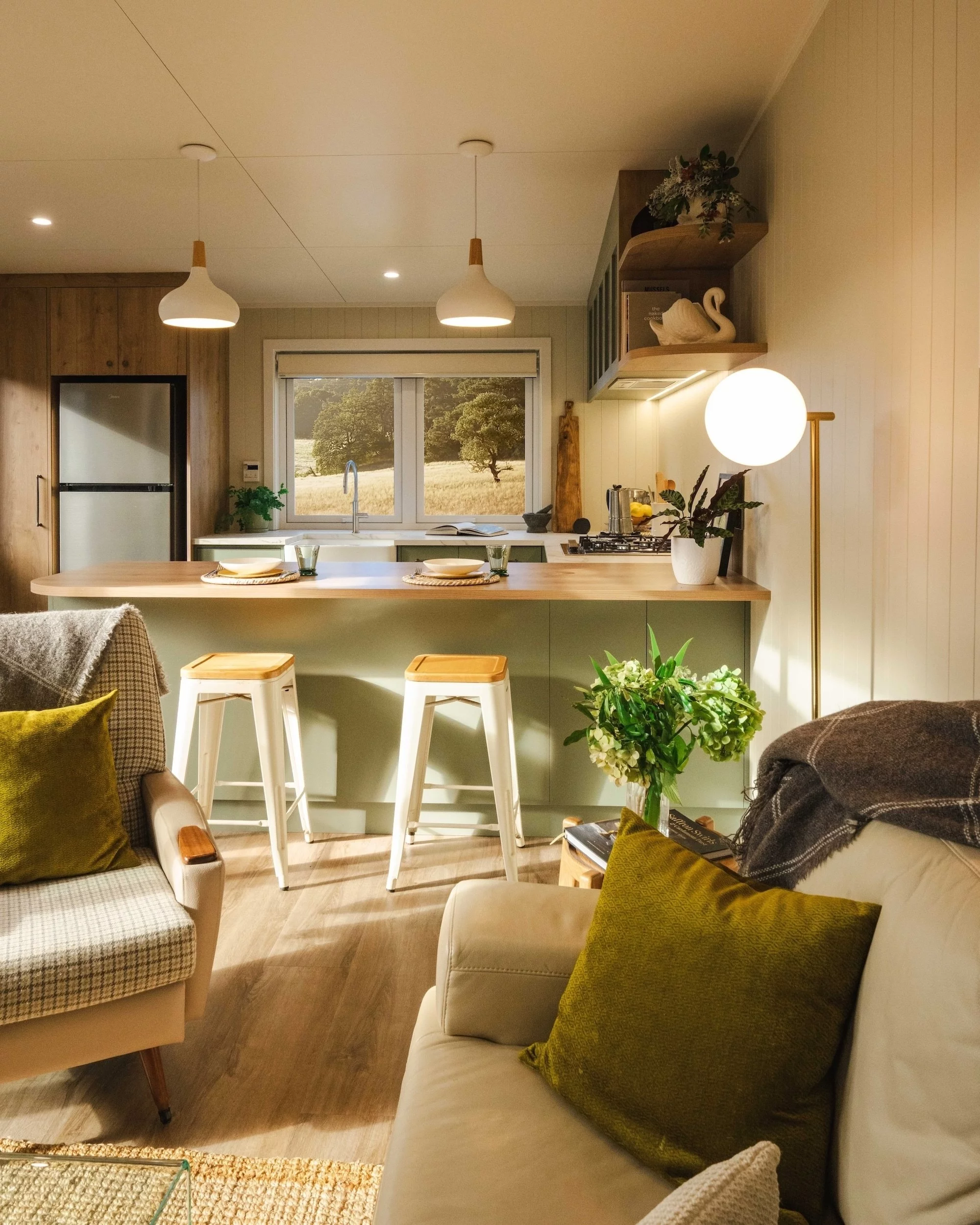 The English Garden's kitchen includes a breakfast bar-style seating area for two