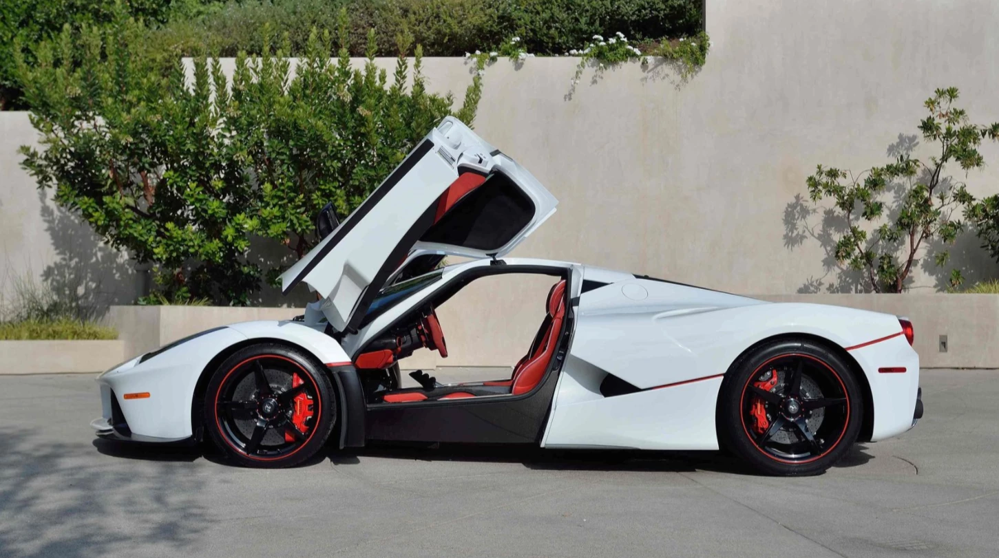 This 2015 Ferrari LaFerrari is estimated to sell for between $4,500,000 and $4,700,000. It has a top speed of 217 mph (350 km/h) and with just 209 miles on it, this car is essentially new. The 6.3L hybrid drive V-12 engine develops 949 horsepower in total, with the hybrid power unit comprising the most powerful naturally-aspirated V12 in the world (6.3 liters producing 788 hp) with a 161 hp electric motor for a total 949 hp transmitted via a 7-speed dual clutch gearbox with energy harvested via a HY-KERS Kinetic Energy Recovery System. Official Auction Page