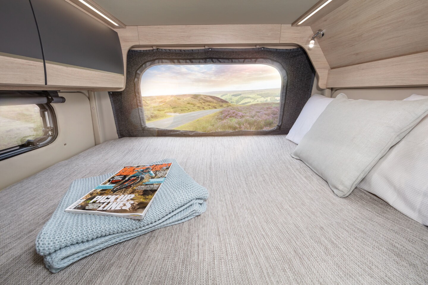 Auto-Trail uses a mesh wall to create an airier raised bedroom
