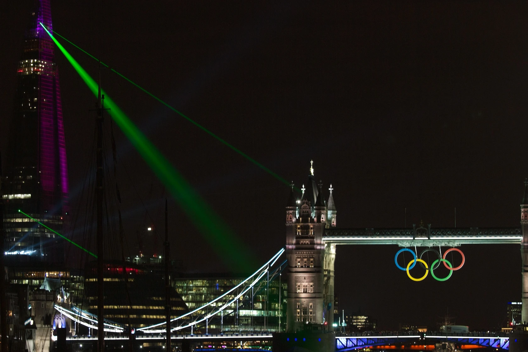 A dozen emerald-green laser beams emanated from the Shard to pick out iconic landmarks including the London Eye, St. Paul's Cathedral and Tower Bridge (1016-ft) Shard in London (Photo: Gideon Hallett)