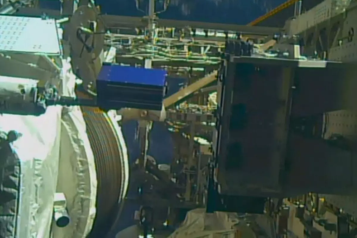 Pills will be placed in Alpha Space's Materials International Space Station Experiment (blue box) outside the ISS