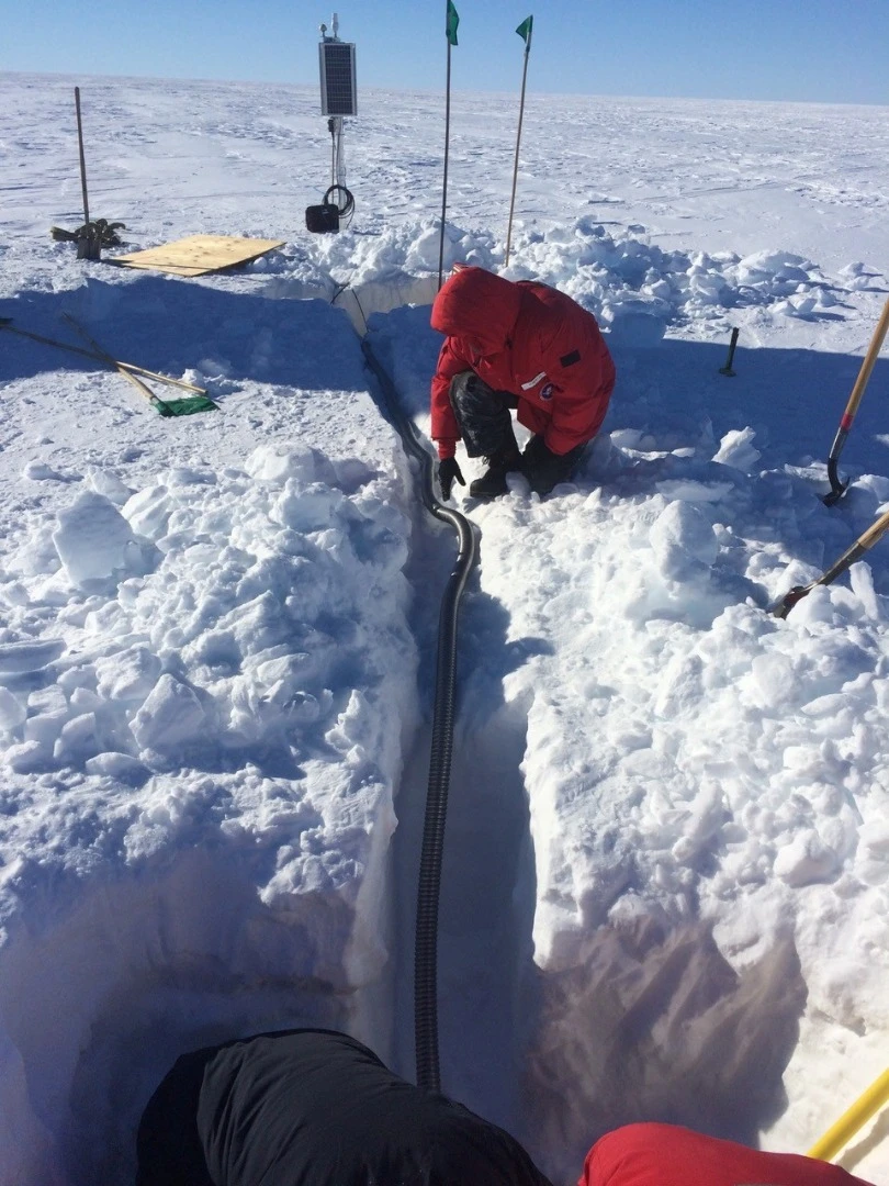 Laying power cables for the solar-powered seismic sensors