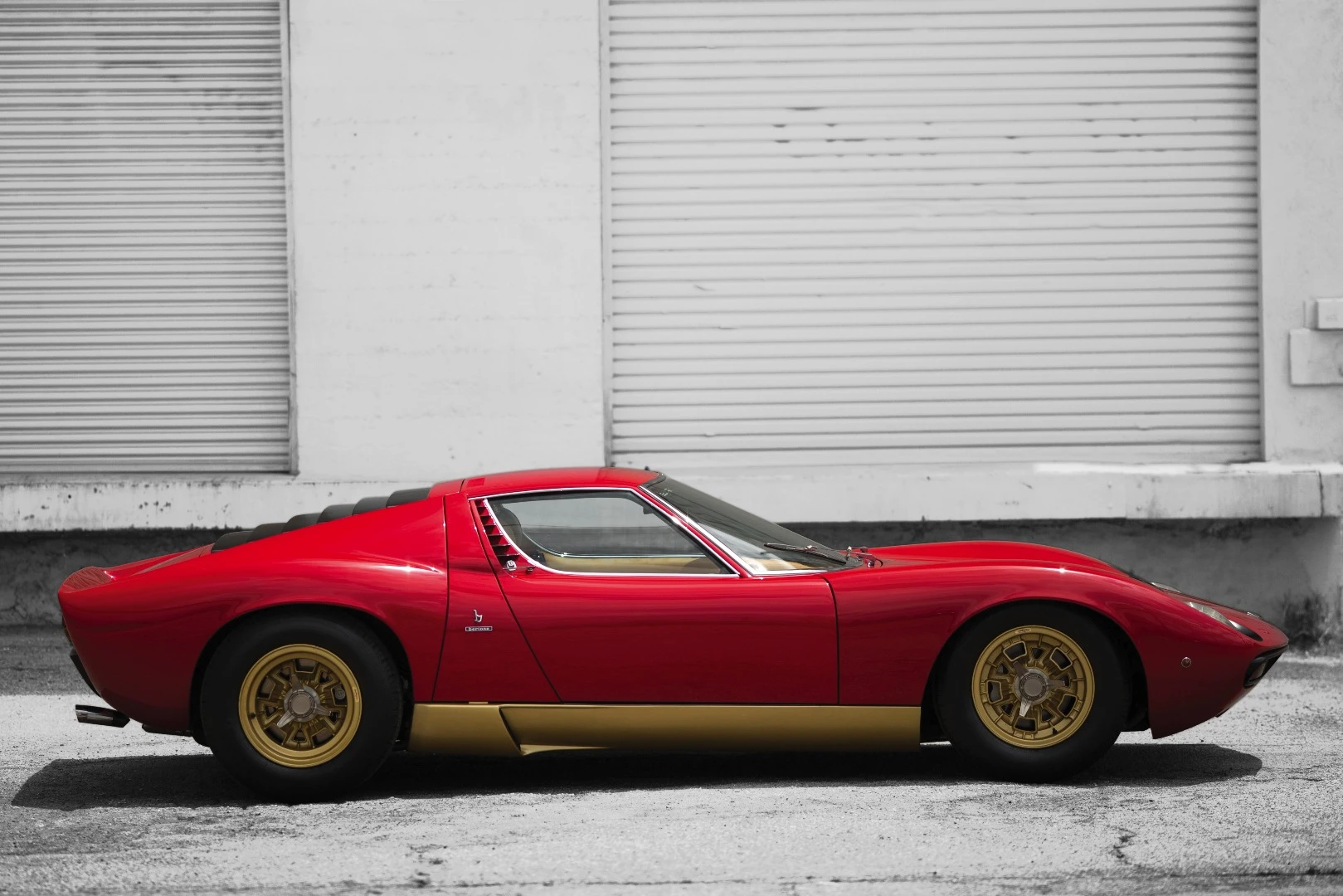 Lot 105 is a 1971 Lamborghini Miura P400 SVn which fetched $2,475,000 to set a new record for the model