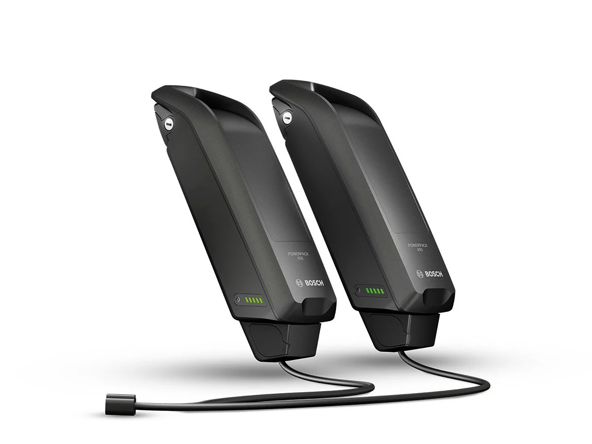 The batteries are connected with a Y cable and have single charging port