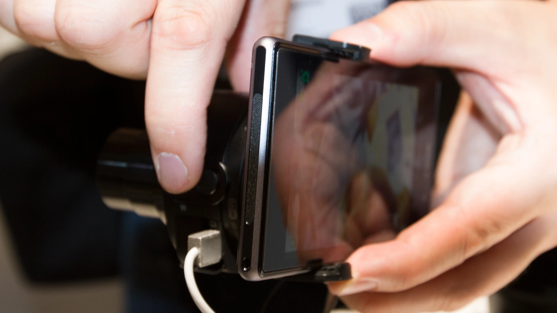The smartphone adapter that connects the QX cameras to a mobile device