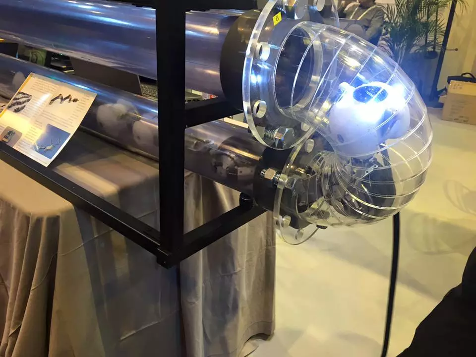 Because of its hinged, segmented design, THESBOT is easily able to make its way through elbow sections and T-joints