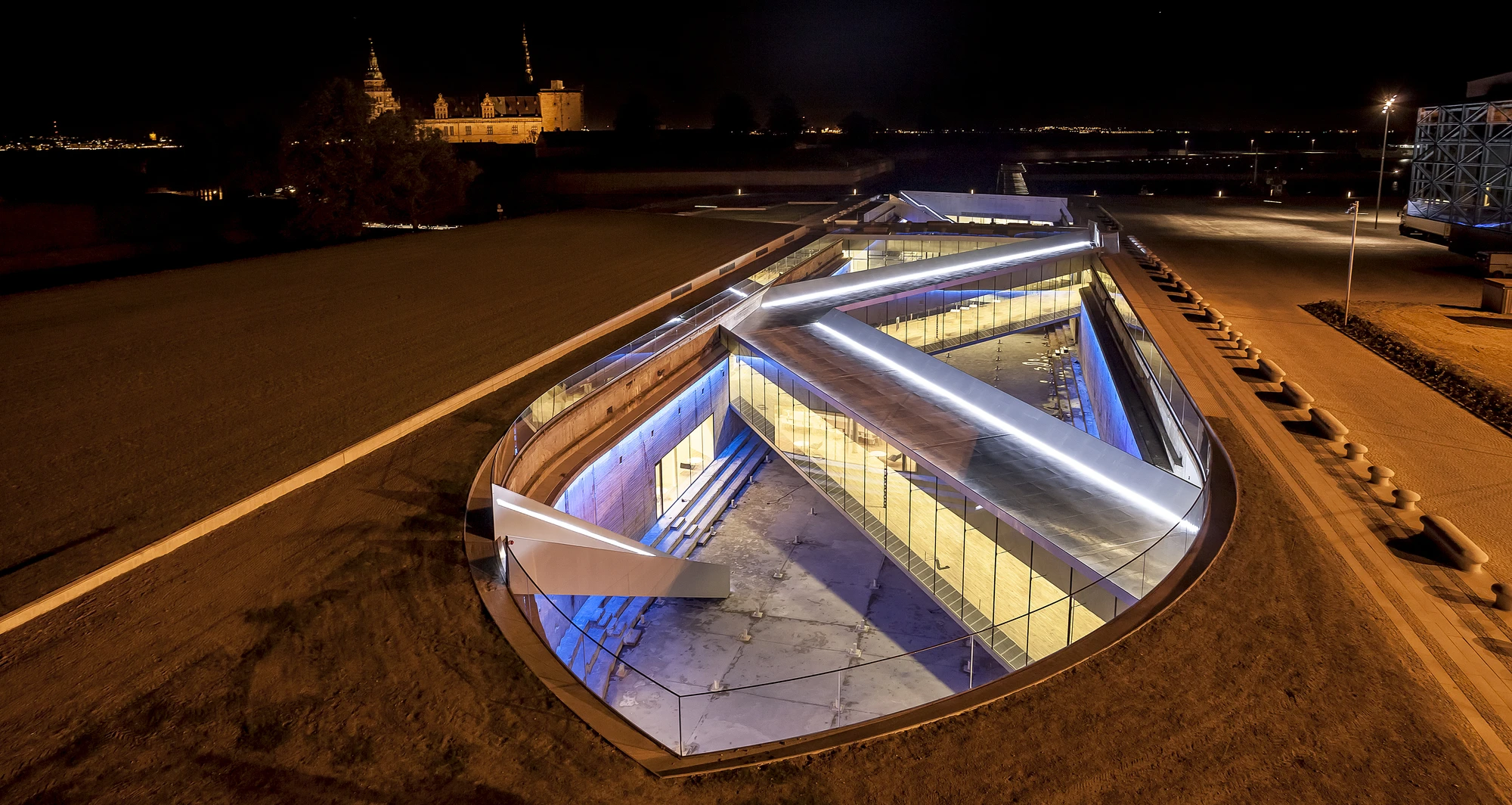 The museum is sunk into a former dry dock, and located adjacent to the historical Kronborg castle (Photo: BIG)