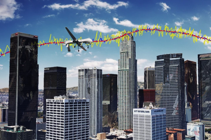 Simulation results for a unmanned drone flying over downtown Los Angeles showing the true trajectory (red line), from GPS only (yellow line), and GPS aided with cellular signals (blue line)