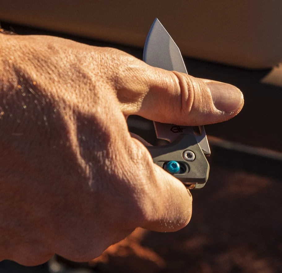 Hit the thumb stud and quickly fold the Assert blade out
