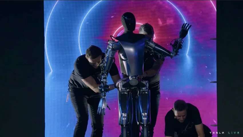 The Optimus prototype gets by with a little help from its friends