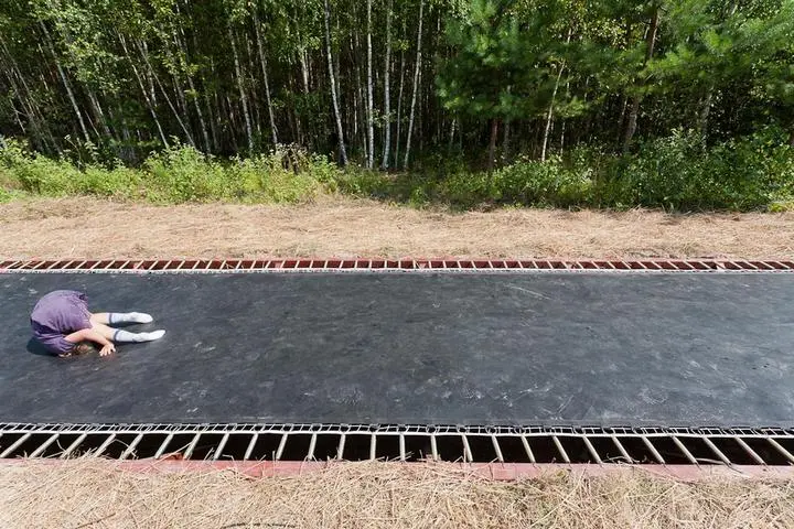 Fast Track invites visitors to playfully bounce along the extended trampoline road