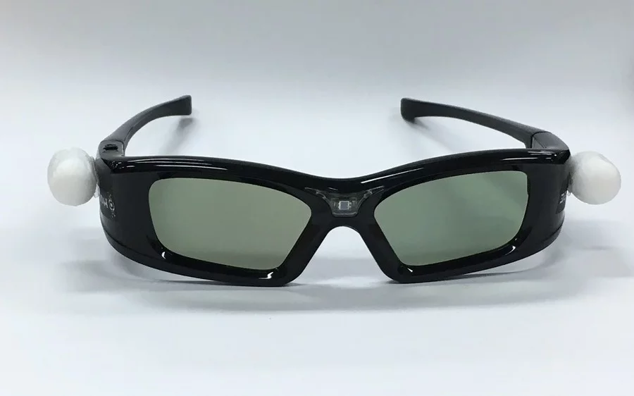 Motion-trackable glasses have a thin coating of crystal film, which is used to filter out a specific image for each eye using frequency separation