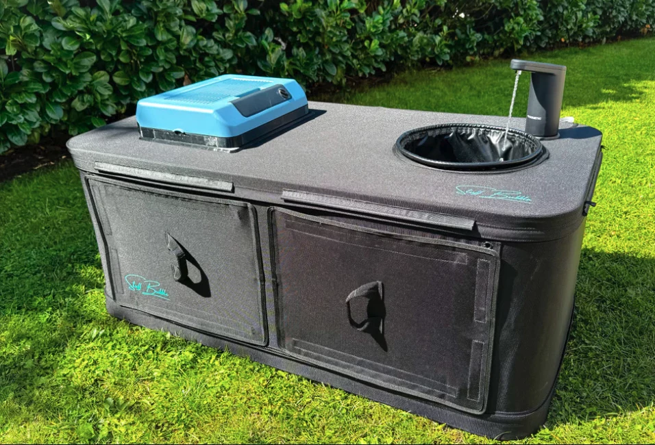 The top level Stuff Bubble kitchen features an inflatable built-in refrigerator and running water system