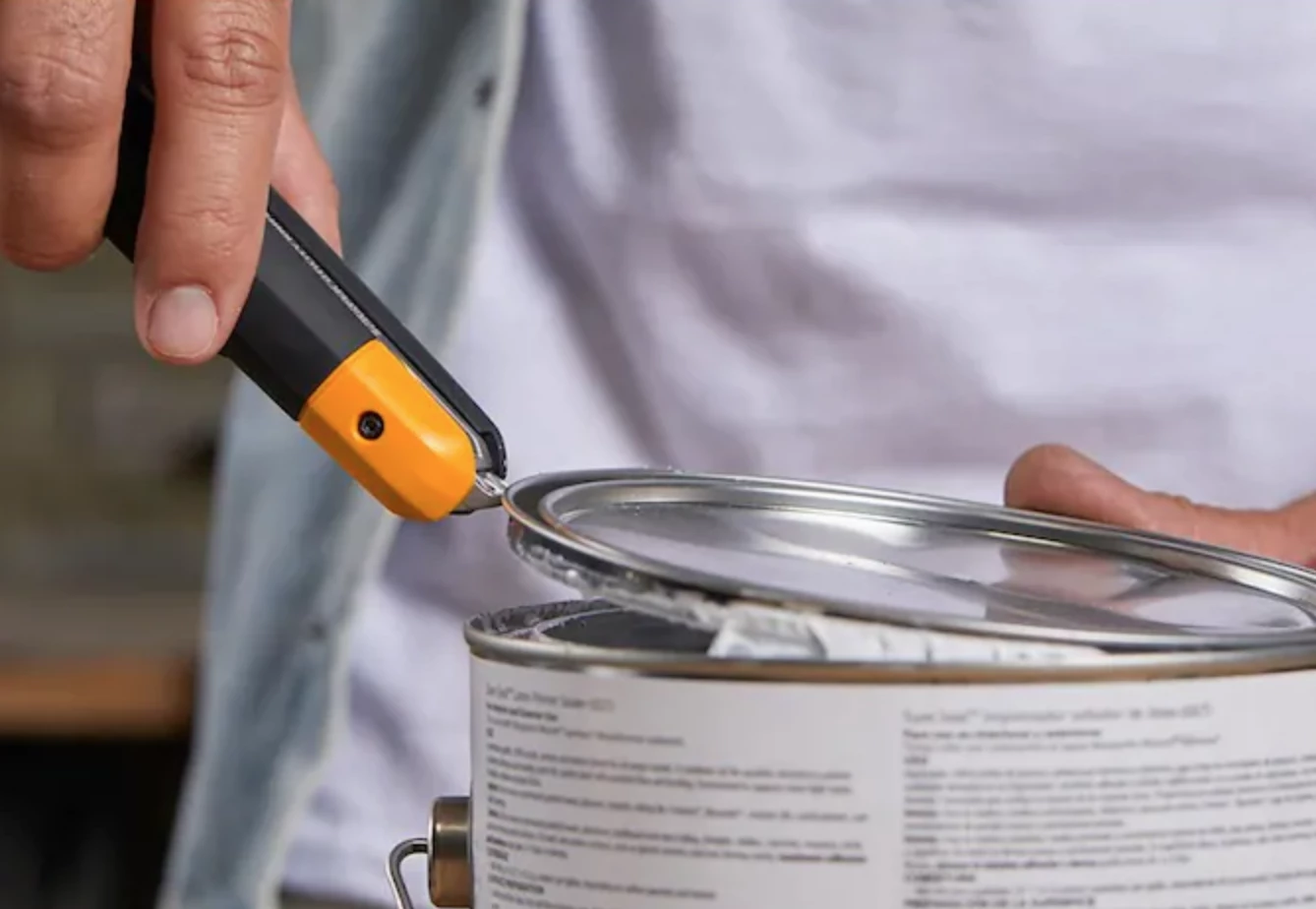 ToughBuilt's Scraper Utility Knife features a paint can opener at the tail end