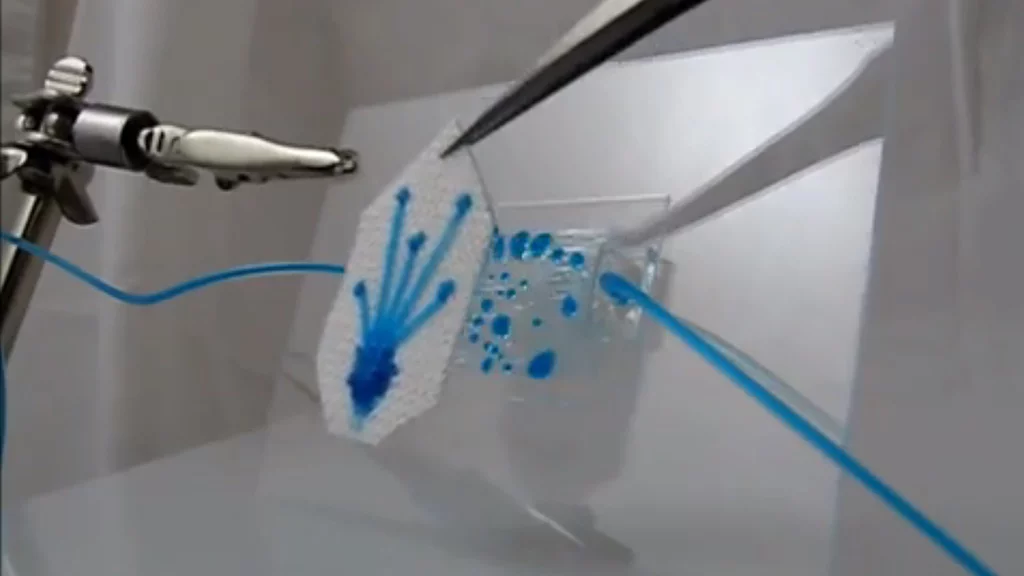 The new fabric sucks sweat from one side to the other where it drains away, as demonstrated here using smurf sweat