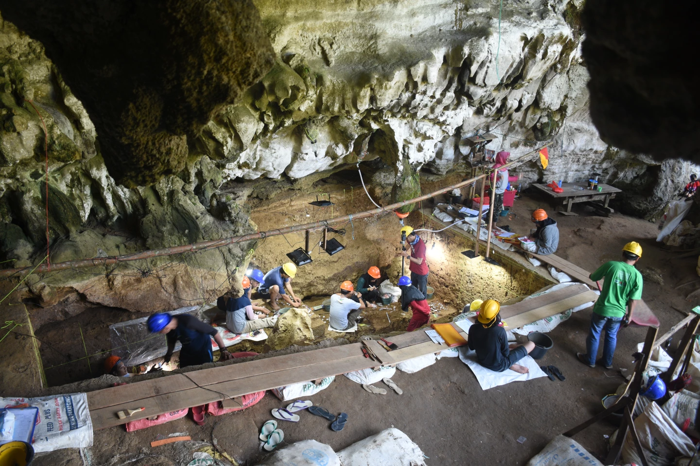 A team working inside the archeological treasure trove that is Leang Bulu Bettue cave