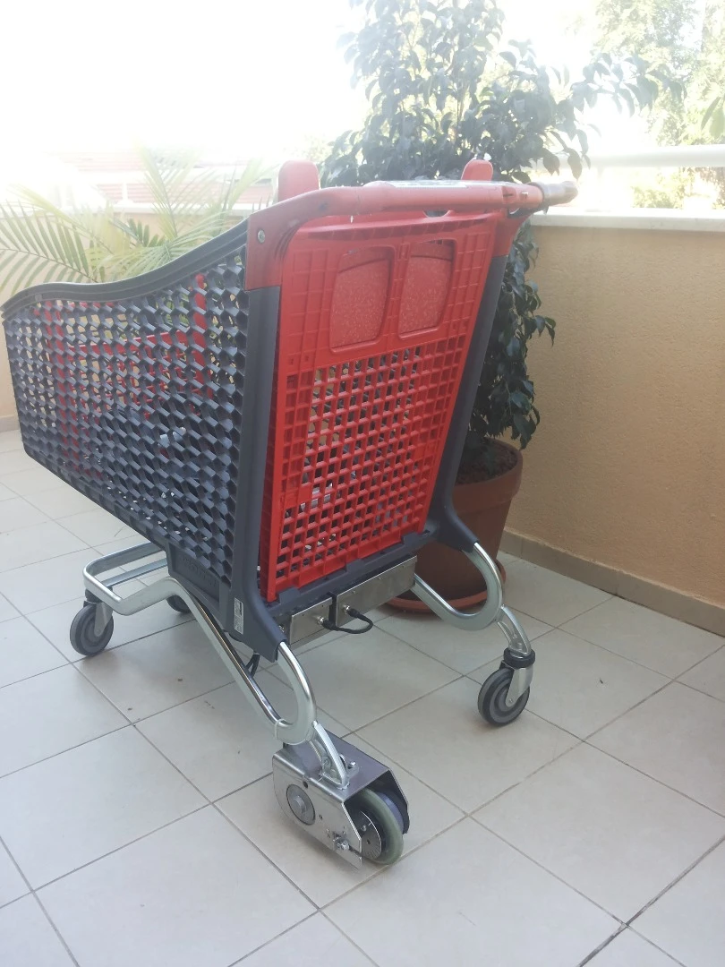 The final version of Hay's electrical super trolley, a supermarket shopping cart that has a motor on it to assist in pushing heavy loads