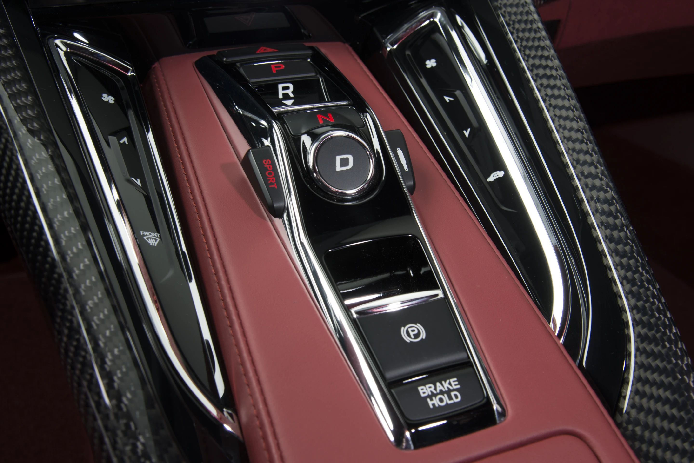 The 2013 NSX Concept interior features red leather and carbon fiber