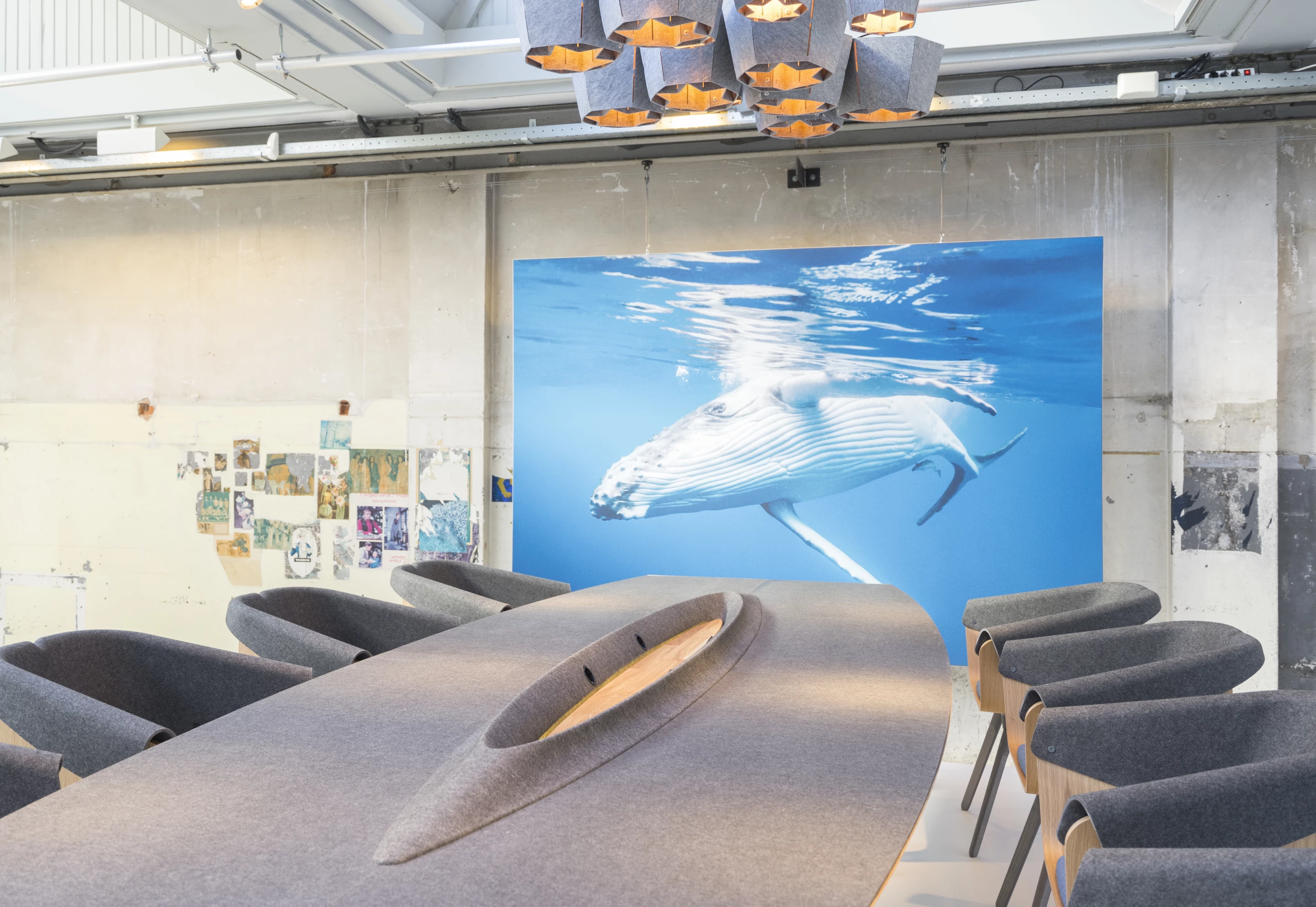 The Plastic Whale boardroom table features a raised ridge along its center