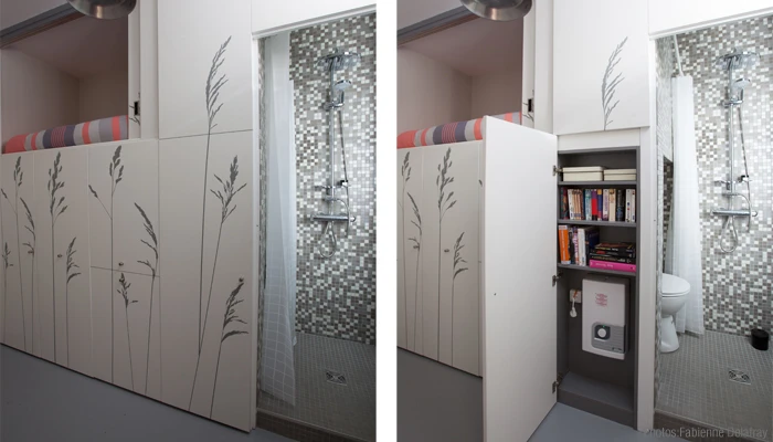 An additional slide-out storage cupboard and a boiler cupboard also containing bookshelves are built into the space below the bed compartment (Photo: Fabienne Delafraye)