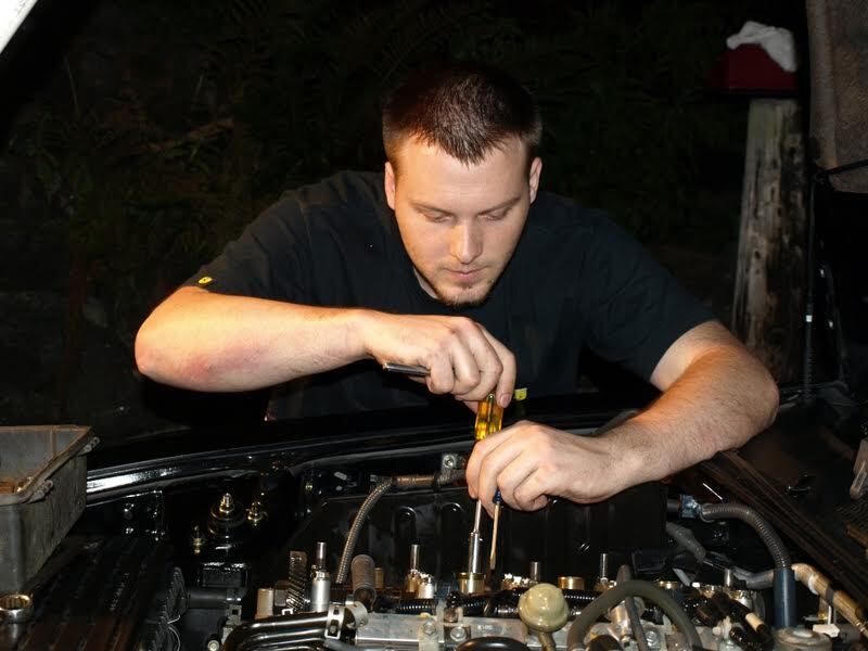 Luke Workman in younger days tuning up a street car. He never worked a job to pay his way through college, instead making his money hustling as a street racer