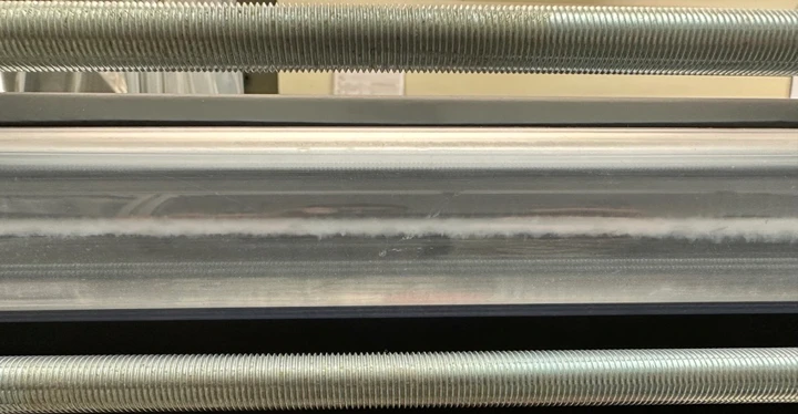A close-up of the system that extracts magnesium from seawater – a stream of sodium hydroxide and seawater flow next to each other, causing magnesium oxide to precipitate out
