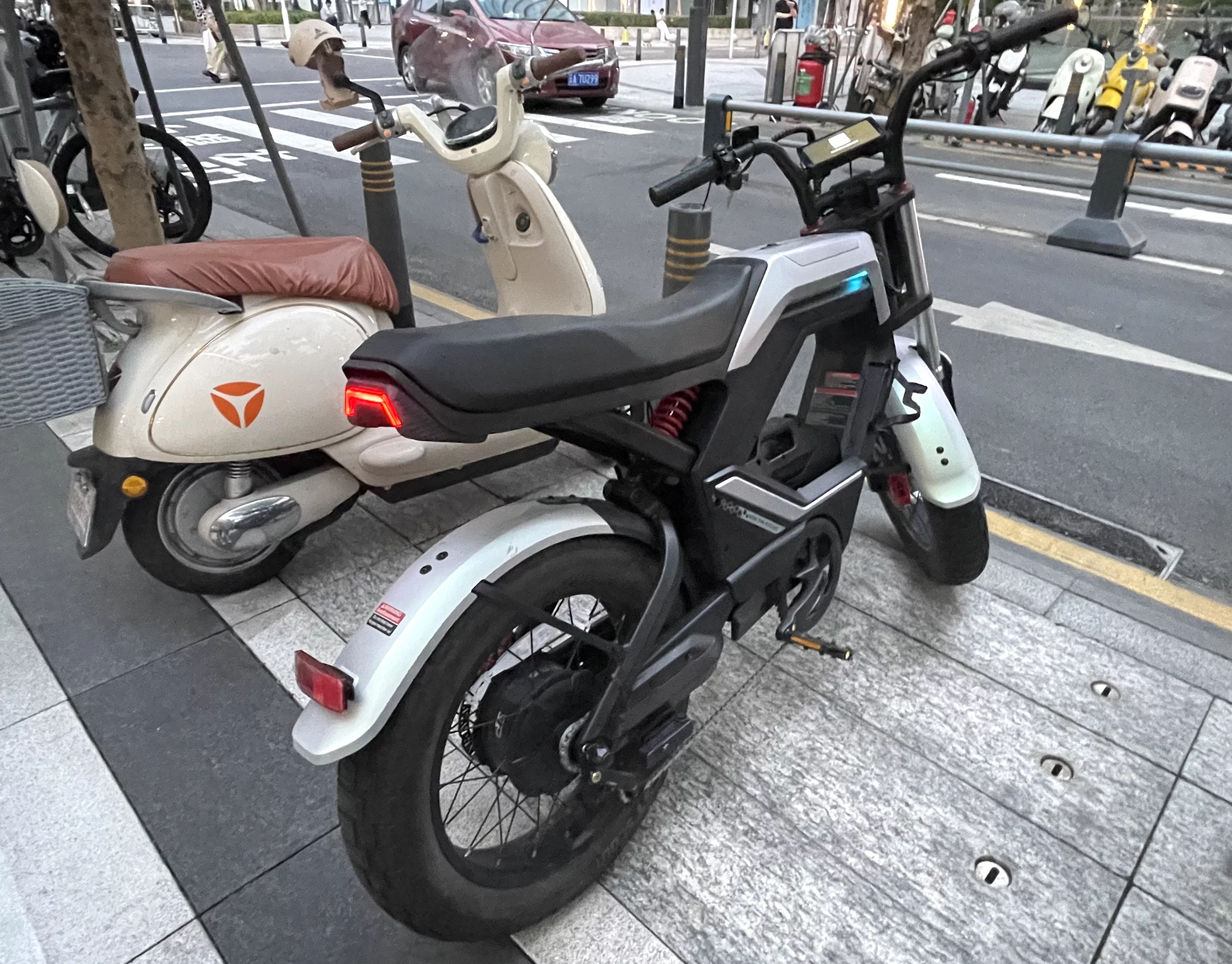 The Flux X26 looks more at home alongside this Yadea electric scooter
