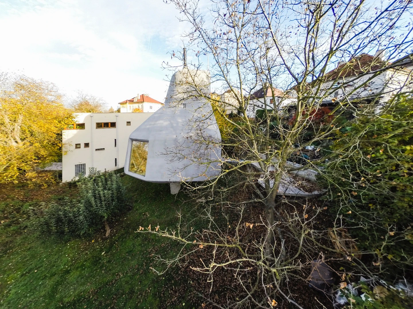 Architect Jan Šépka told us that the unusual concrete stilt the House in the Orchard sits atop was used because it was much cheaper than typical foundations would be on such a sloped site