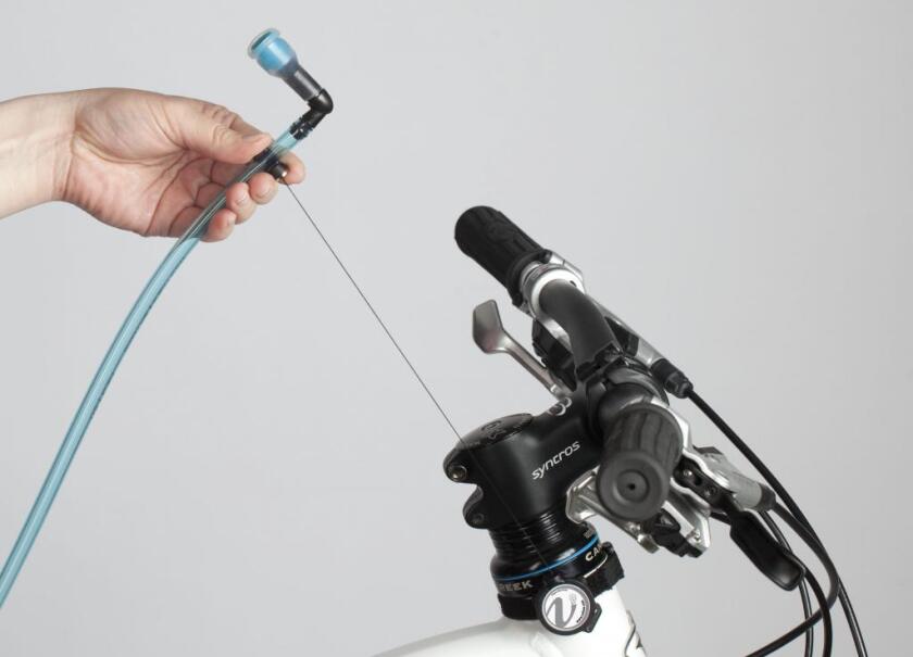 The VelEau is a cyclist's hydration system, that mounts on the bike instead of the rider