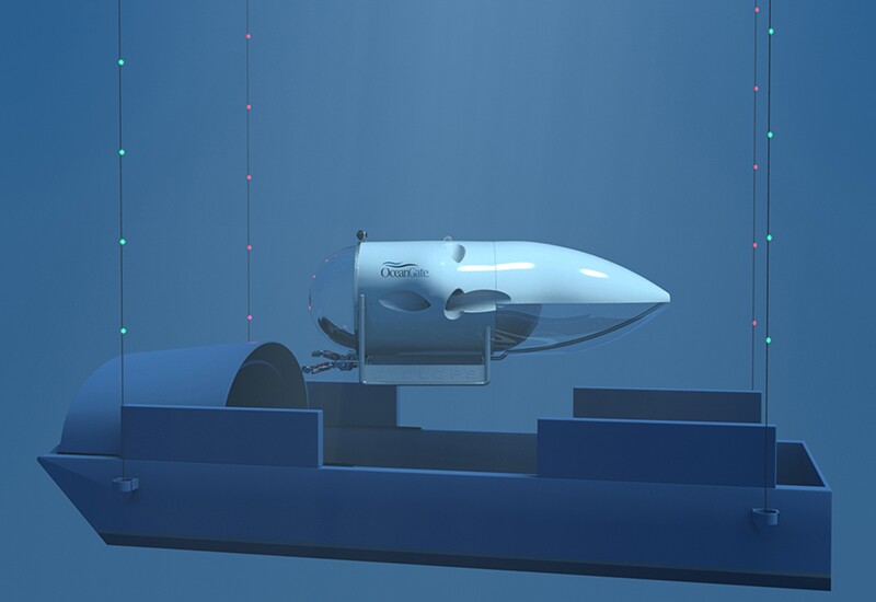 The Cyclops returning to its submerged launch/recovery vessel, which is lowered and retrieved by a ship at the surface