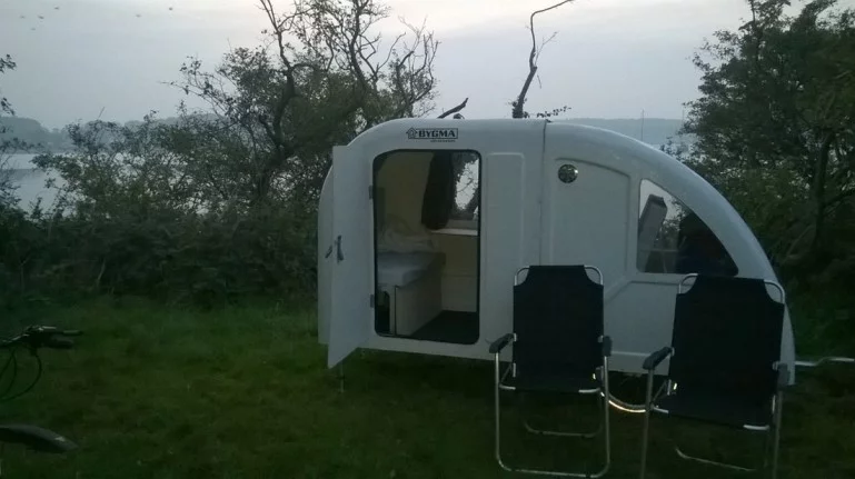 The Wide Path cabin includes a folding table and convertible beds