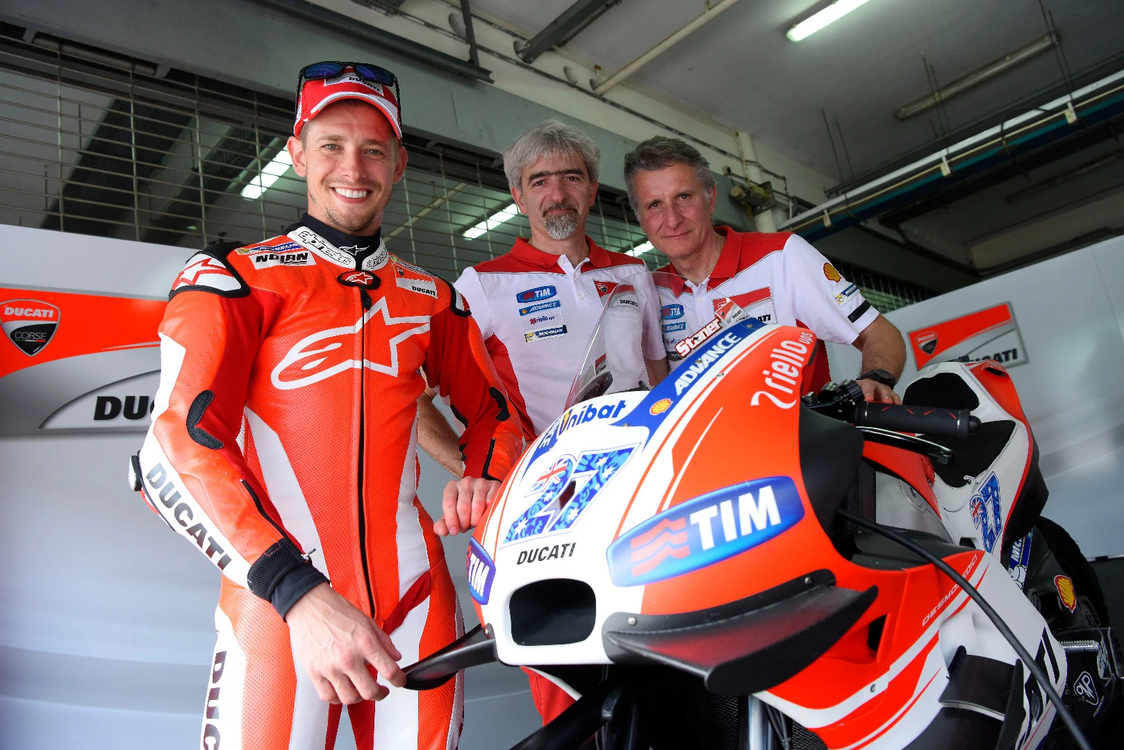 Ducati Team hired its favorite champion, Casey Stoner (left), as a test rider. Next to him are General Manager, Luigi Dall' Ignia (center) and Sporting Director, Paolo Ciabatti (right)