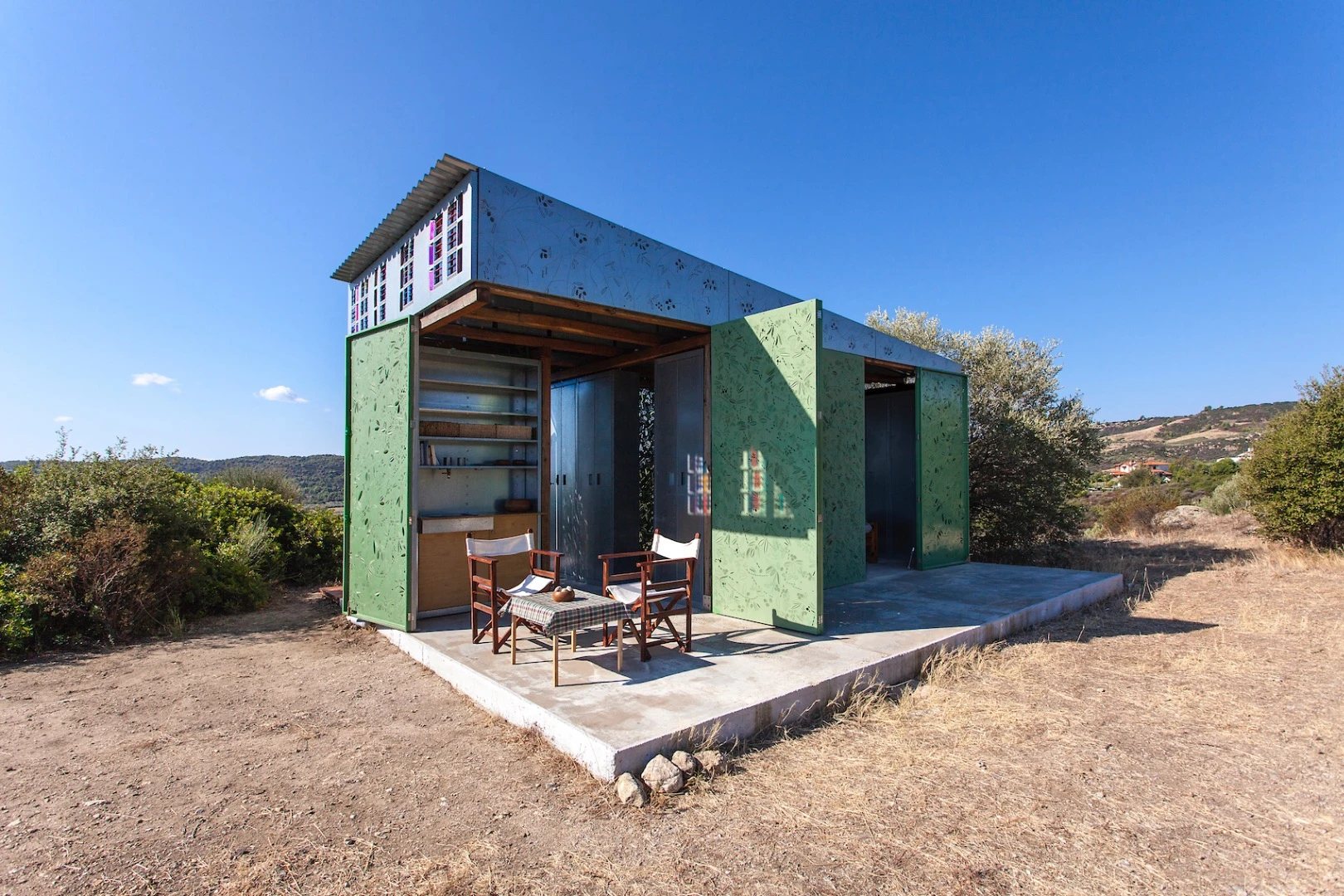 The Olive Tree House's owners dine outside, on the north-east side of the home which is the most protected from the sun and receives the prevailing breeze from the sea