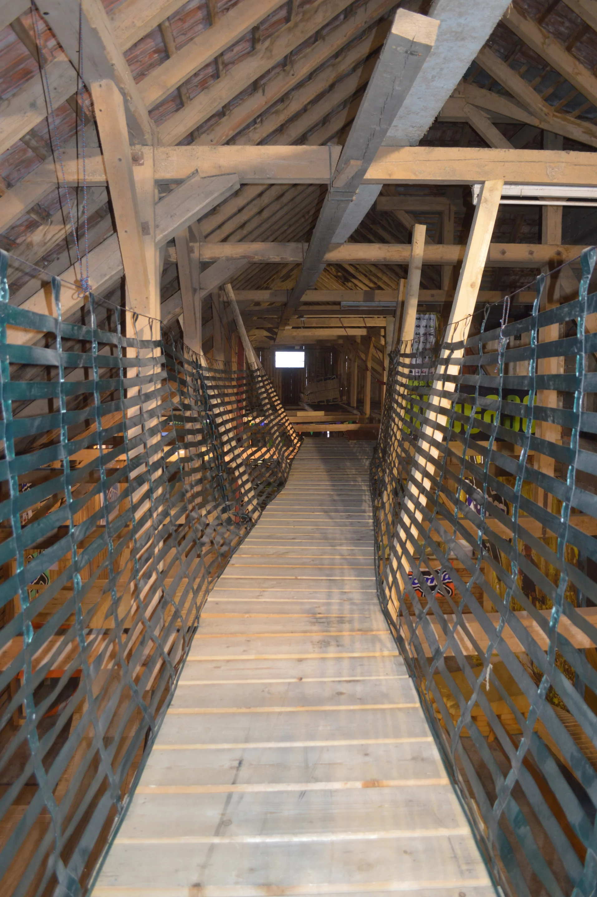 Inside the barn bike park - ride the plank (into a foam pit)