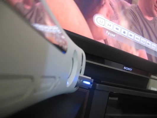 The Xbox 360 playing XviD video from a Mac formatted USB drive