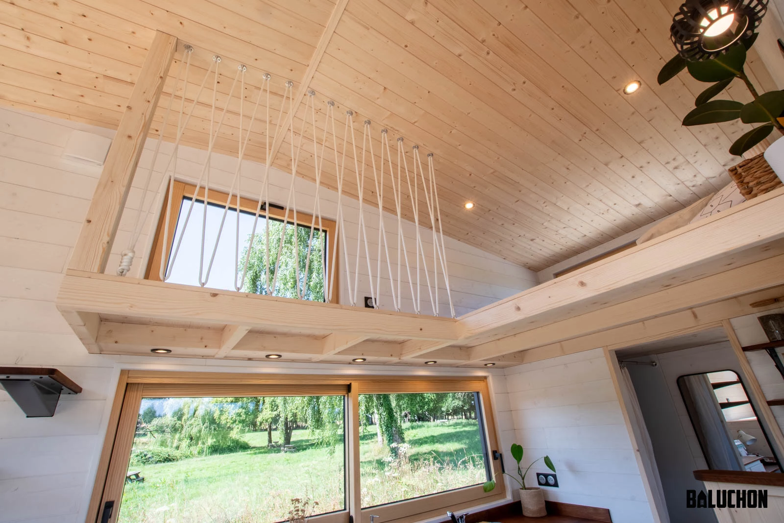 The Nouvelle Dans' upstairs bedroom is reached by a short gangway from the living room