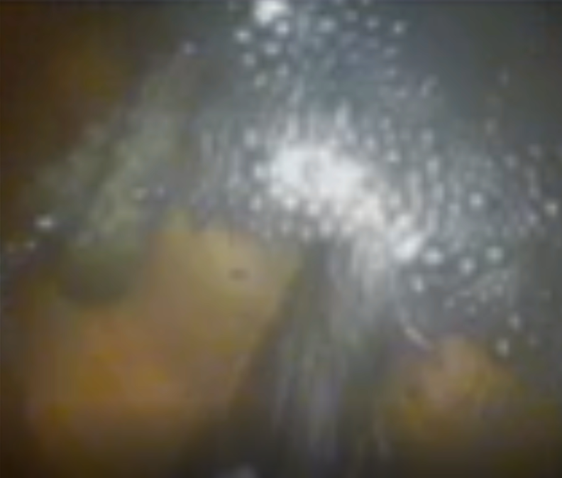 A photo taken from inside the Titan ocean test chamber, by the team's specialized video camera and borescope