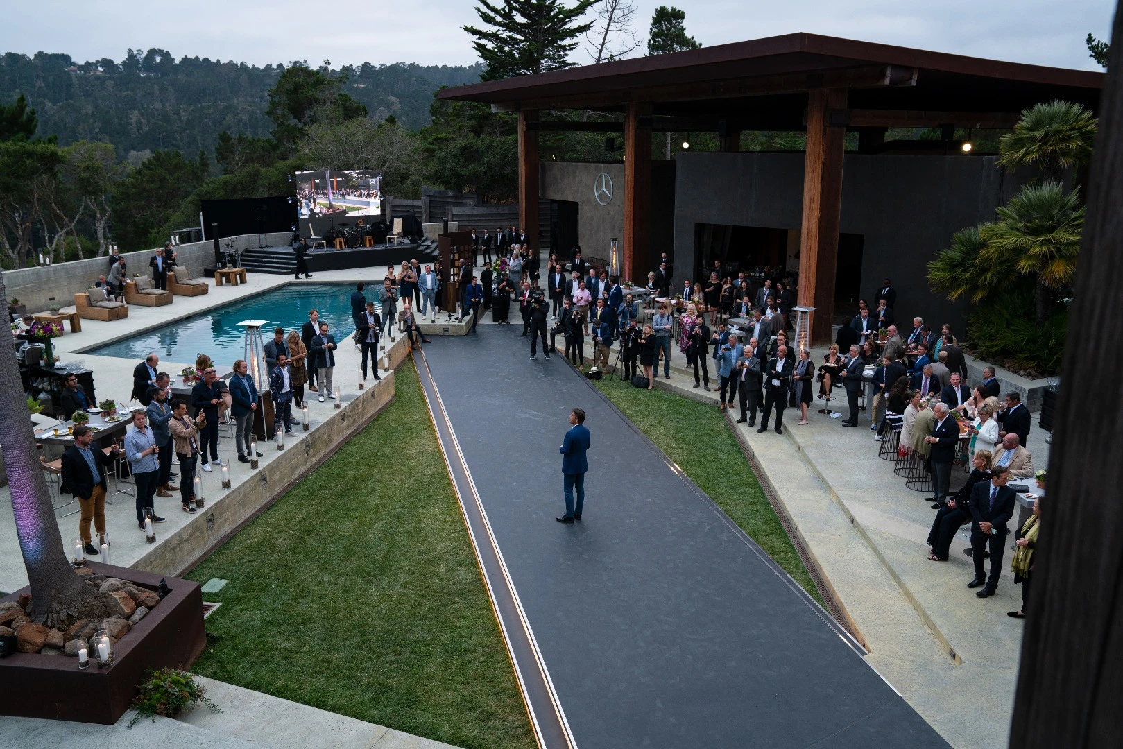 Onlookers await the unveiling of the Vision EQ Silver Arrow concept at Monterey Car Week