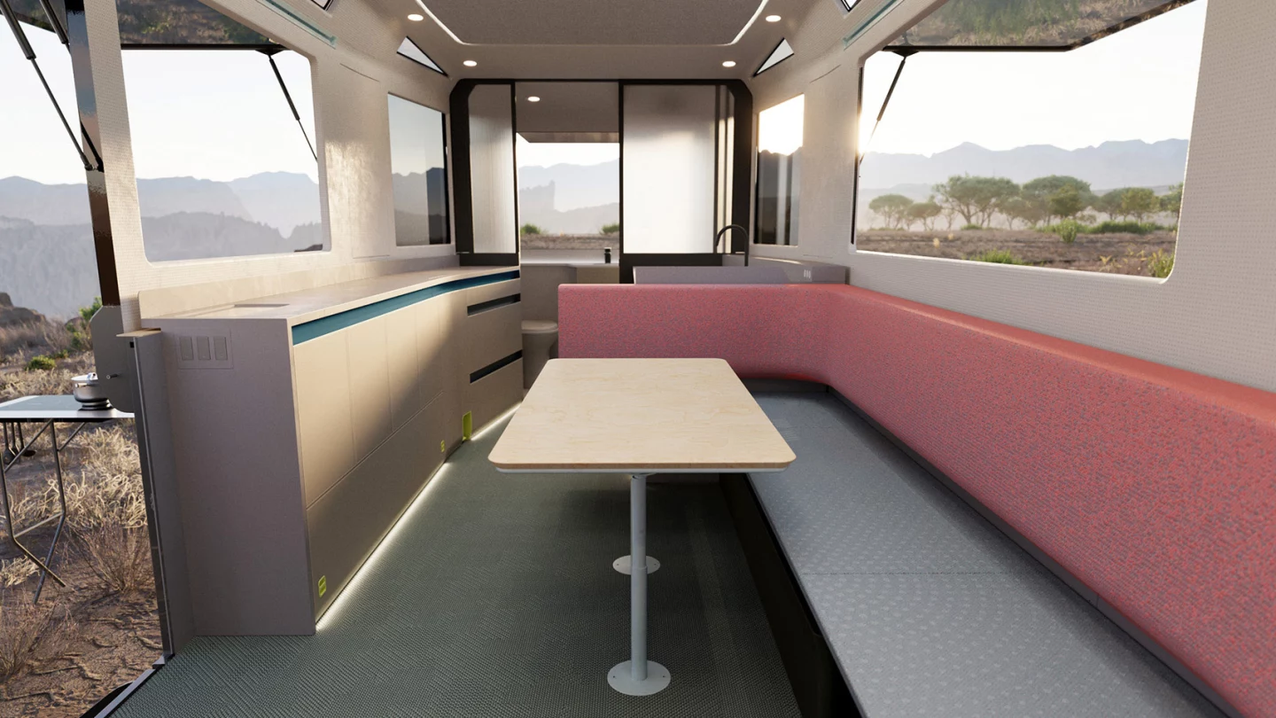 Lightship shows a simple interior with sofa lounge, bathroom and kitchen block