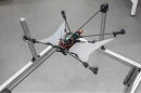 The flying squirrel drone, pictured here in a rig that holds it stationary for observation