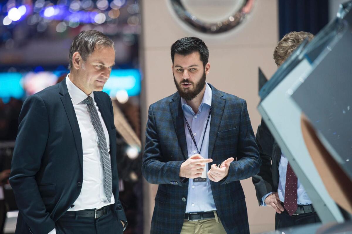 Mate Rimac (right) and Porsche's Lutz Meschke