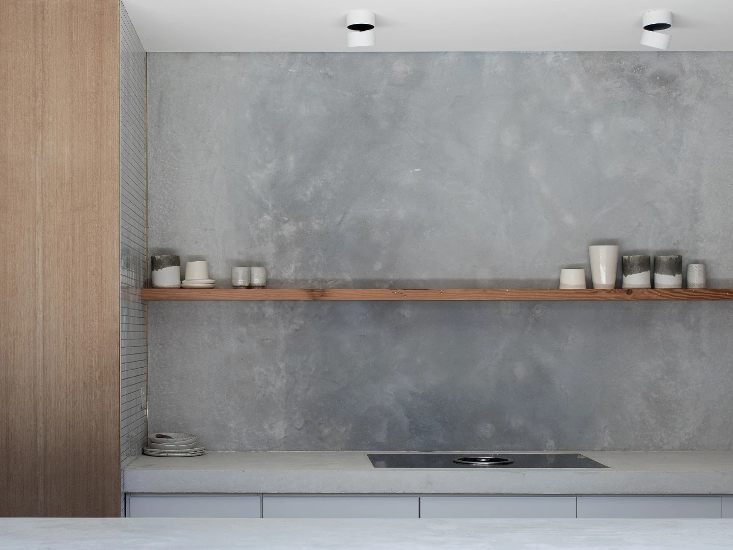 The home features a fully equipped wall kitchen